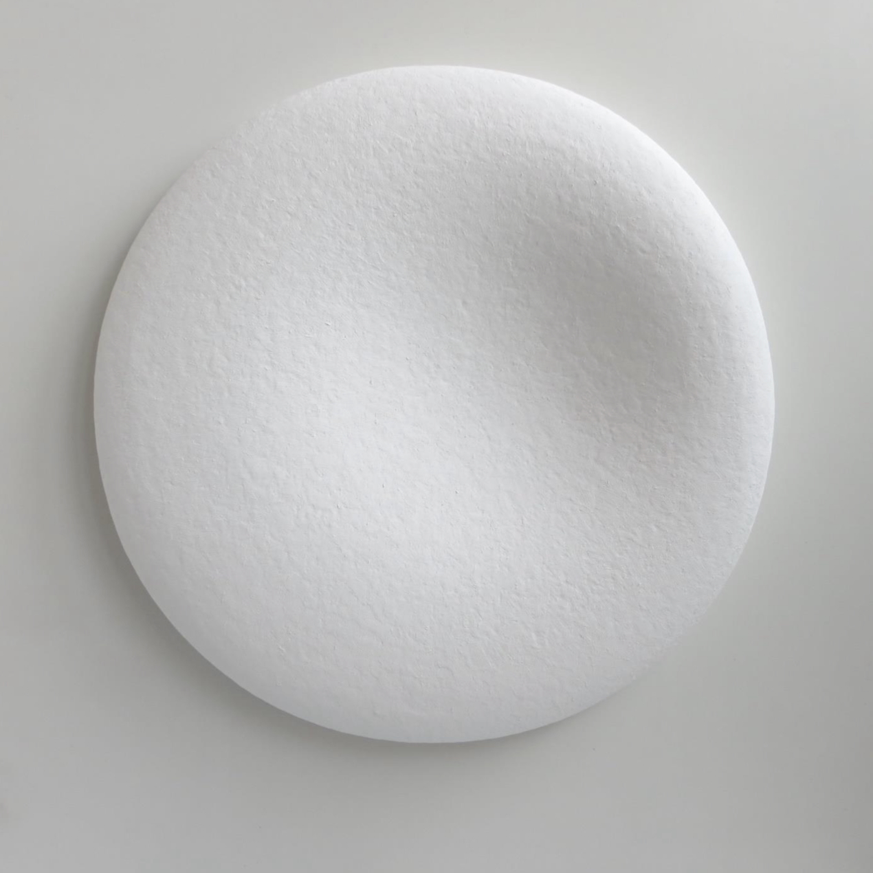 Yumiko Yoneda, Inner circle 50225, 2025, modelling clay, plaster, polystyrene, 50x50x6cm